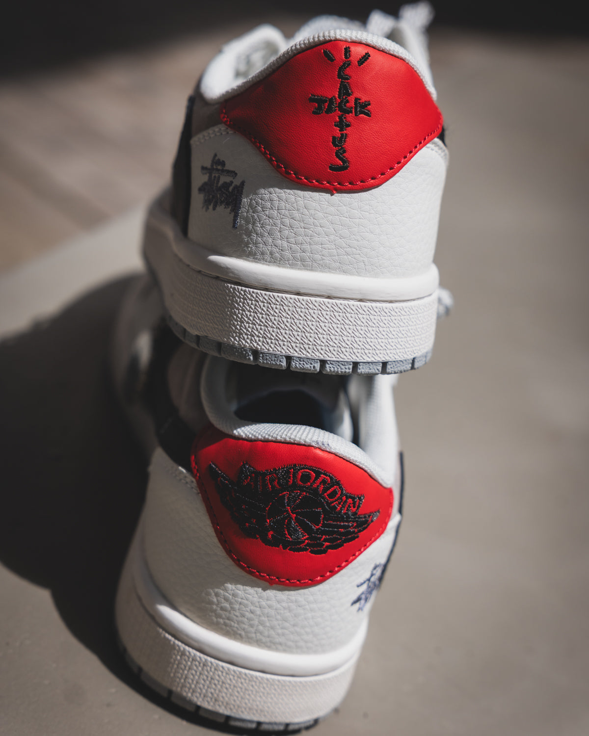 Jordan 1 Low Travis X Stussy